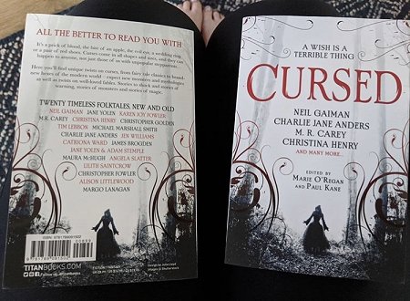 Front and back covers for Cursed, edited by Marie O'Regan and Paul Kane