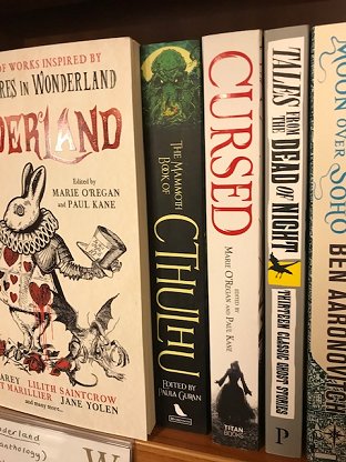 Waterstones bookshelf, featuring Wonderland and Cursed, edited by Marie O'Regan and Paul Kane