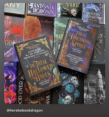 photograph showing copies of In These Hallowed Halls and These Dreaming Spires, both edited by Marie O'Regan and Paul Kane, lyiing on top of a display of hardback fantasy novels