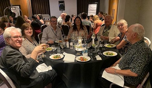 The PS Publishing banquet table at FantasyCon 2023. L to R: Paul Kane, Marie O'Regan, Mike Smith, Sheryl Smith, Ramsey Campbell, Jenny Campbell, Peter Crowther