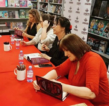 Authors signing copies of In These Hallowed Halls, edited by Marie O'Regan and Paul Kane. L to R: Kate Weinberg, Tori Bovalino, Helen Grant and Marie O'Regan