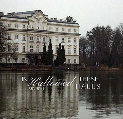 photograph of a white building with four storeys, beside a body of water lined with trees. Text reads In These Hallowed Halls, reviews. Part One