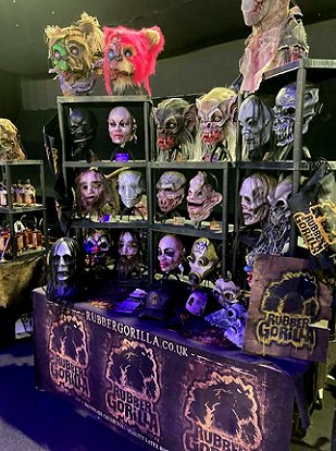 stall at HorrorCon UK featuring model heads of various movie monsters