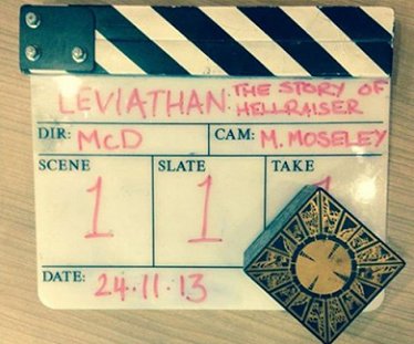 Photograph of clapperboard for LEVIATHAN The story of Hellraiser, and a puzzle box