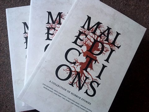 Contributor copies of Maledictions, A Collection of Horror Stories