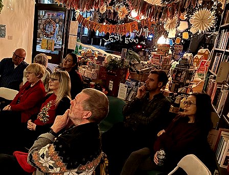 photograph of the full audience for the One More Chapter event