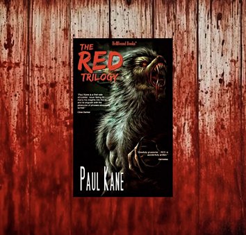 image of a copy of The RED Trilogy by Paul Kane against a bloodstained wooden background