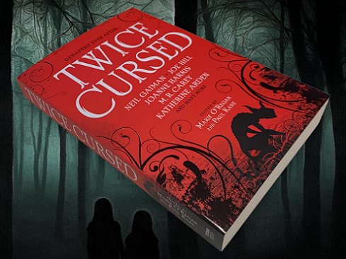 image showing a copy of Twice Cursed, edited by Marie O'Regan and Paul Kane, against a background of a dark wood, with two small figures silhouetted