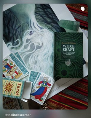 photograph showing a copy of Beyond and Within Witchcraft, edited by Marie O'Regan and Paul Kane, lying on top of a print of the witch portrayed in the frontispiece of the book, and a tarot deck.