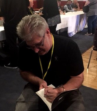 Paul Kane signing copies of Ten Tall Tales