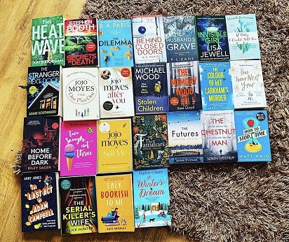 Display of books, including Her Husband's Grave by P L Kane