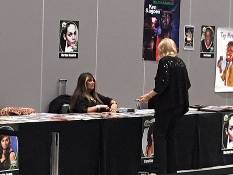 Caroline Munro chats to a fan, Liverpool HorrorCon