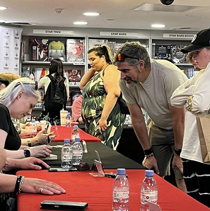 Alexandra Benedict signing The Other Side of Never, edited by Marie O'Regan and Paul Kane
