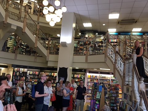 audience listening to Jo Jakeman at Sticks and Stones launch