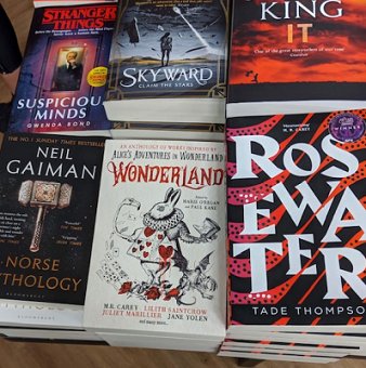 Display featuring Wonderland, edited by Marie O'Regan and Paul Kane